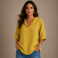 Laura – Blusa de corte holgado